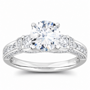 White gold three-stone diamond engagement ring for holiday proposals and Christmas ring shopping