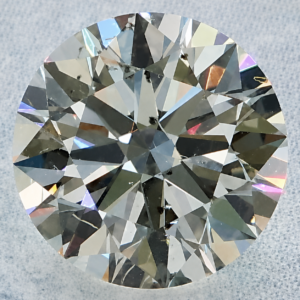 Natural 0.9 Carat N SI3 Round PGS Diamond