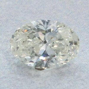 0.74 Carat Oval EGL Natural Diamond K-I1 Very Good symmetry, Very Good polish.